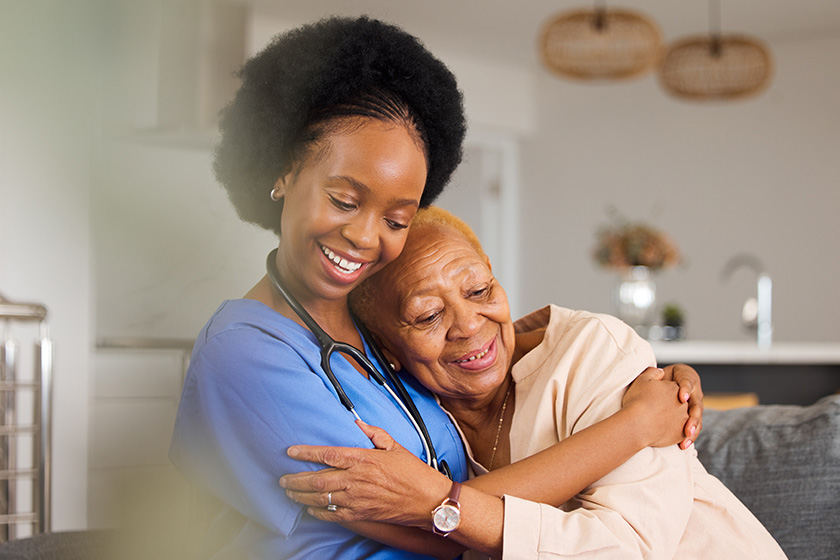 black people hug nurse elderly care support trust healthcare old