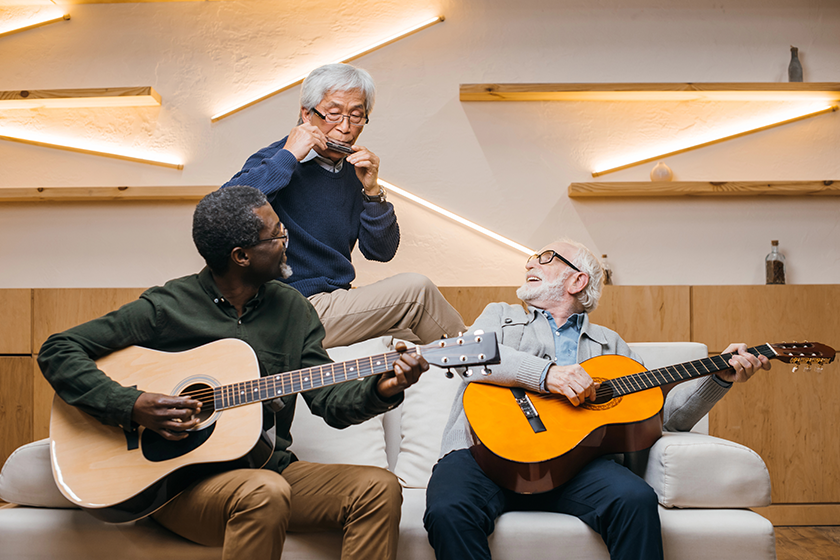 senior friends playing music