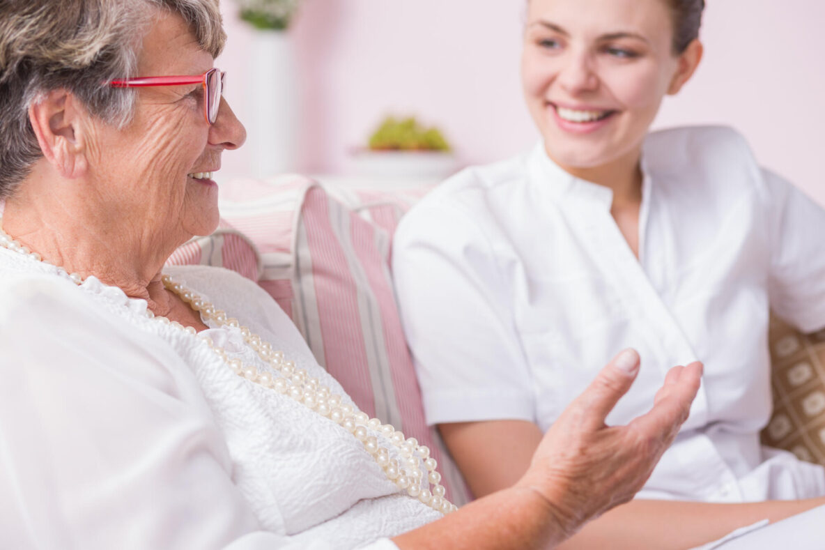 Smiled,Nurse,Listening,To,The,Story,Narrating,By,Elder,Woman